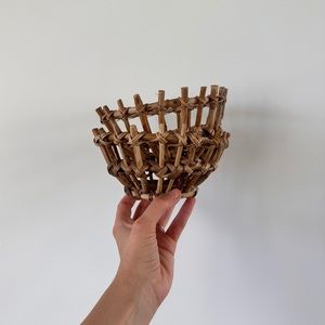 two small woven bowls from anthropologie